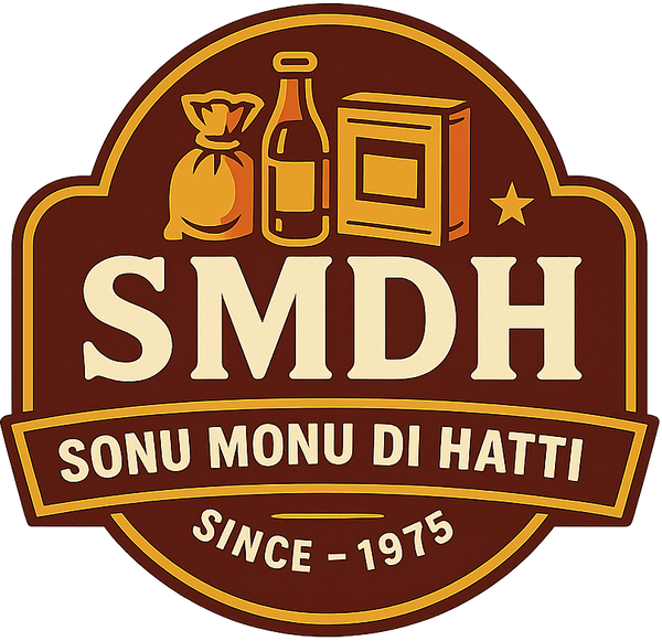 A vintage-style round logo badge with the text 'SMDH' and 'SONU MONU DI HATTI SINCE - 1975' on a white background. The badge is dark brown with cream lettering and outlines, plus simple illustrations of a sack, bottle, and box at the top.